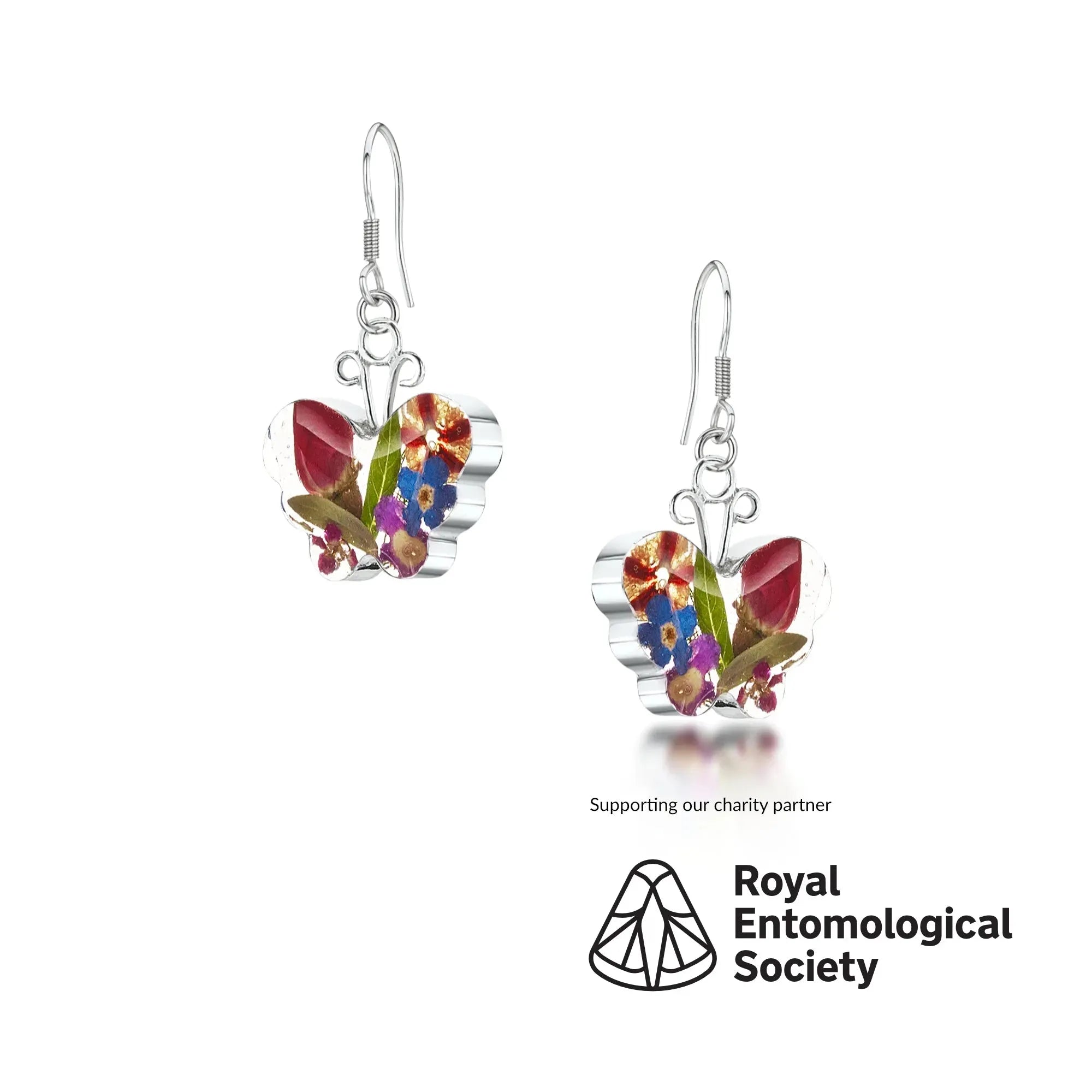 Boucles d'oreilles papillon par Shrieking Violet® Boucles d'oreilles pendantes en argent sterling avec de vraies fleurs. Cadeau de bijoux idéal pour les amateurs de papillons.