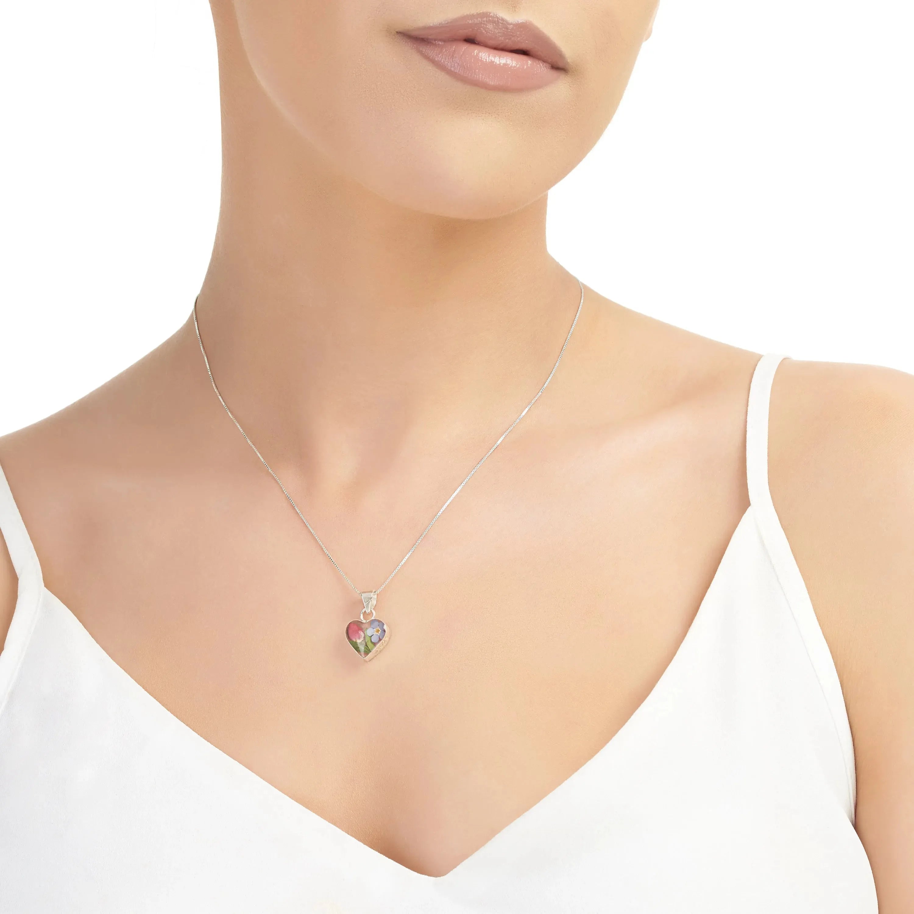 Pendentif cœur en argent sterling avec une véritable myosotis et une rose miniature