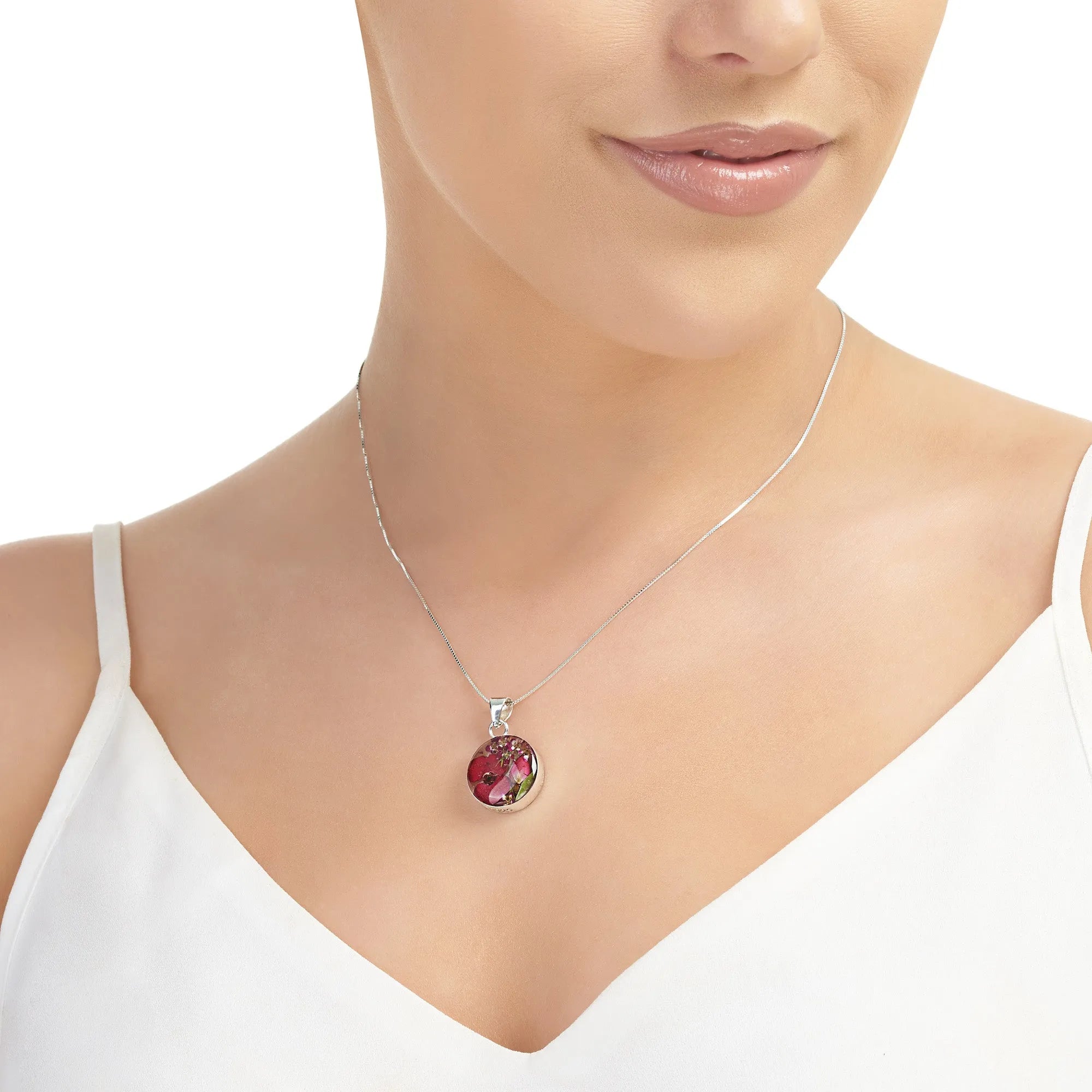 Petit pendentif rond avec de vraies fleurs d'Euphorbia – Argent