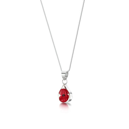 Poppy necklace by Shrieking Violet® Sterling silver teardrop pendant with a tiny poppy (Euphorbia milii). Handmade with real flowers